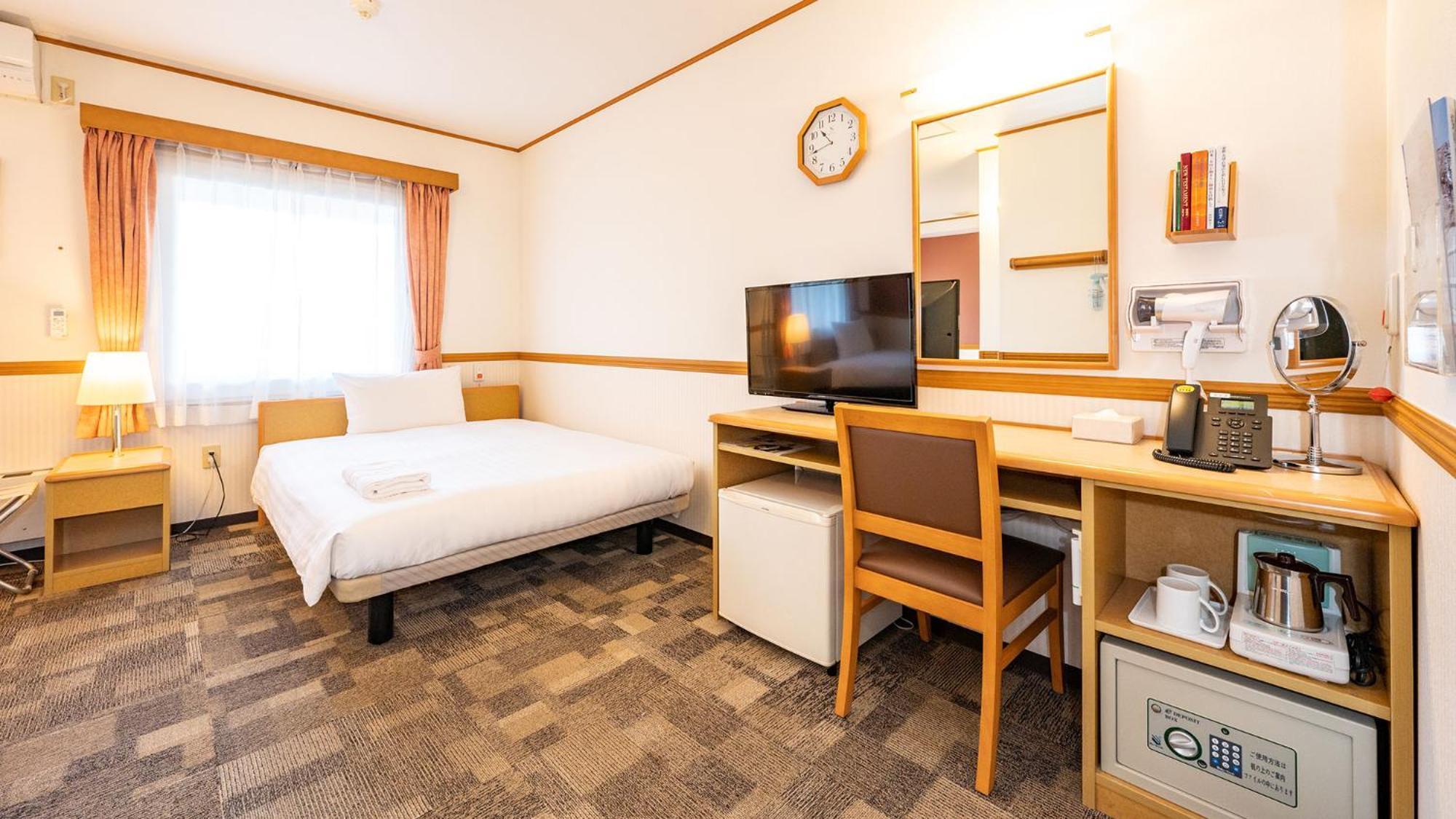 Toyoko Inn Nagoya Owari Ichinomiya Ekimae Номер фото